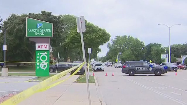 Shooting, robbery; armored truck guard dies